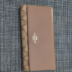 Signature Coach Wallet.Tan And Brown. Iconic Logo And Elegant Design. Like New!